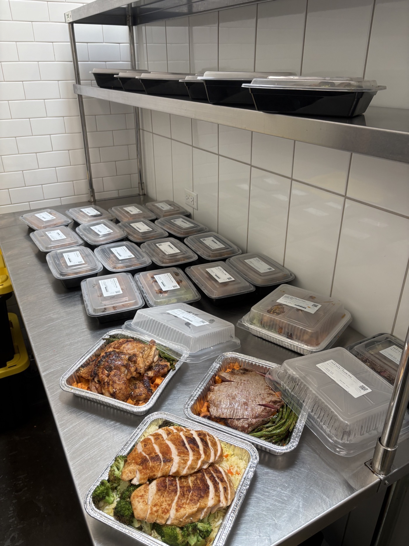 A counter of Full Time Food meals packed and ready for Sunday delivery